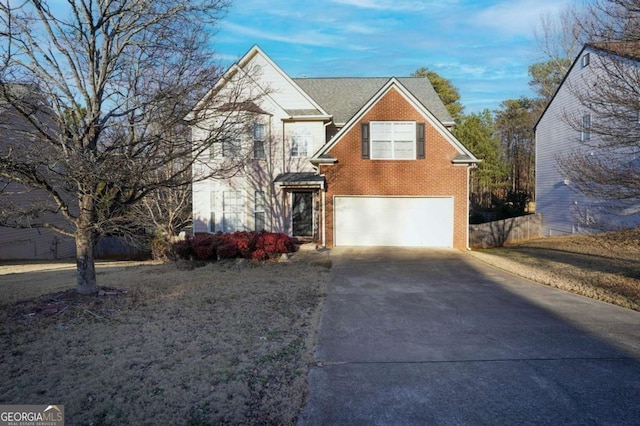 860 Sweet Mill Ln, Lawrenceville, GA 30045 - traditional home with concrete driveway, brick siding, and an attached garage