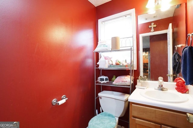 860 Sweet Mill Ln, Lawrenceville, GA 30045 - half bath featuring vanity and toilet