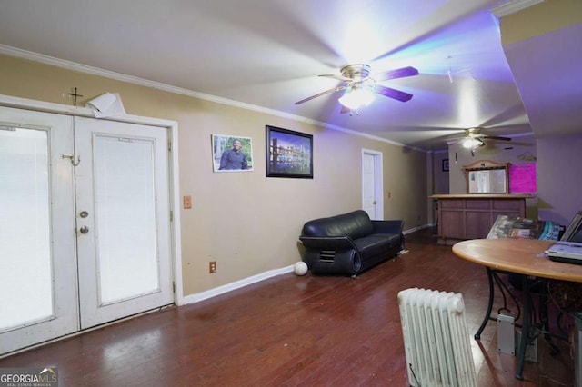 860 Sweet Mill Ln, Lawrenceville, GA 30045 - living area with crown molding, wood finished floors, a ceiling fan, and radiator
