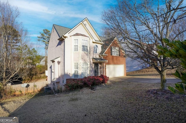 860 Sweet Mill Ln, Lawrenceville, GA 30045 - view of front of home featuring driveway and an attached garage