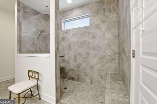 5744 Cypress Bluff Ln, Hoschton, GA 30548 - bathroom featuring a walk in shower and baseboards