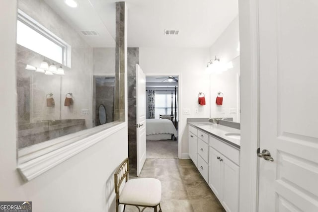 5744 Cypress Bluff Ln, Hoschton, GA 30548 - bathroom featuring double vanity, ensuite bath, and ceiling fan