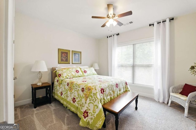 5744 Cypress Bluff Ln, Hoschton, GA 30548 - carpeted bedroom with baseboards and a ceiling fan