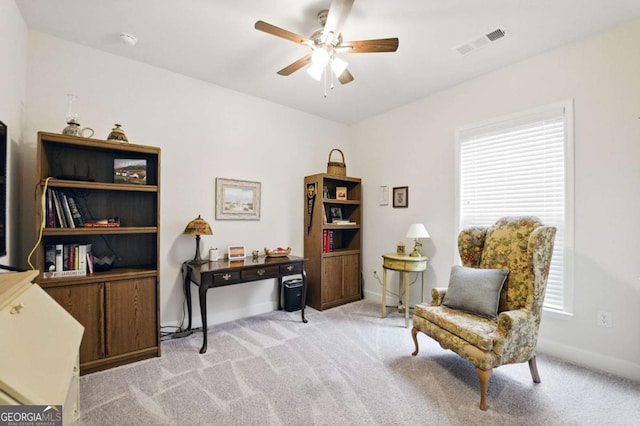 5744 Cypress Bluff Ln, Hoschton, GA 30548 - living area featuring a ceiling fan, light carpet, and healthy amount of natural light