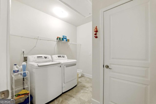 5744 Cypress Bluff Ln, Hoschton, GA 30548 - laundry room featuring washing machine and clothes dryer and attic access