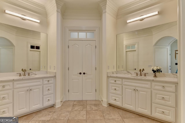 8230 Royal Melbourne Way, Duluth, GA 30097 - bathroom with two vanities and ornamental molding