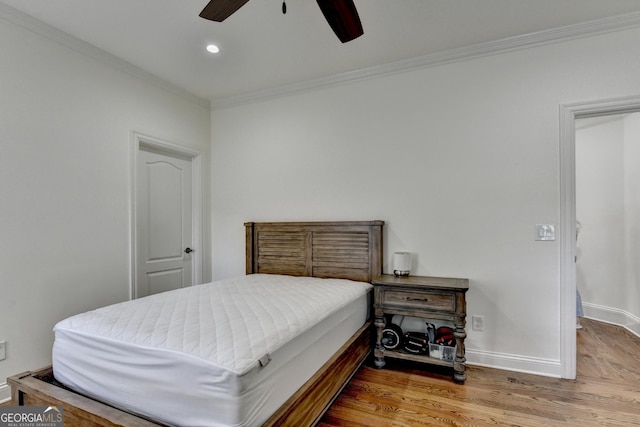 8230 Royal Melbourne Way, Duluth, GA 30097 - bedroom with crown molding, wood finished floors, recessed lighting, and ceiling fan
