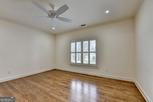 8230 Royal Melbourne Way, Duluth, GA 30097 - spare room featuring crown molding, a ceiling fan, wood finished floors, and recessed lighting