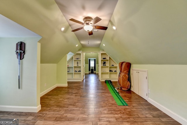 8230 Royal Melbourne Way, Duluth, GA 30097 - additional living space with built in features, vaulted ceiling, a ceiling fan, wood finished floors, and recessed lighting