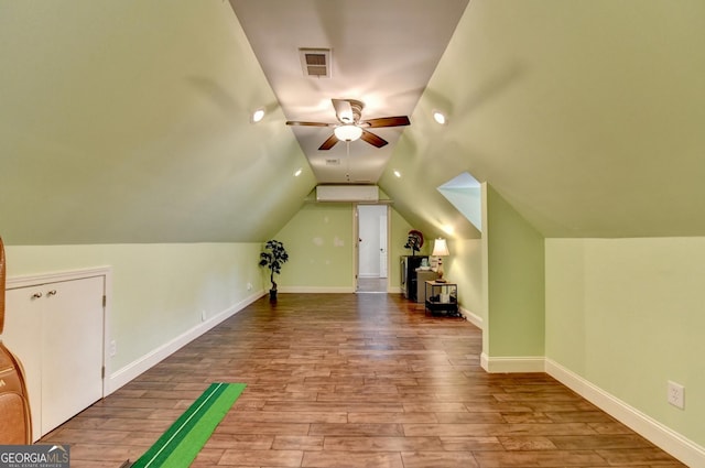 8230 Royal Melbourne Way, Duluth, GA 30097 - bonus room featuring ceiling fan, wood finished floors, vaulted ceiling, and an AC wall unit