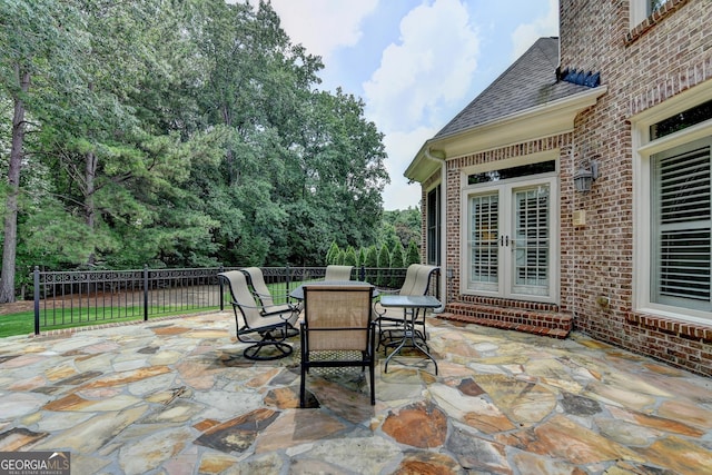 8230 Royal Melbourne Way, Duluth, GA 30097 - view of patio / terrace featuring french doors and outdoor dining space