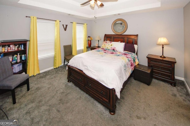 1964 Cutters Mill Way, Lithonia, GA 30058 - bedroom featuring a raised ceiling, carpet, and ceiling fan
