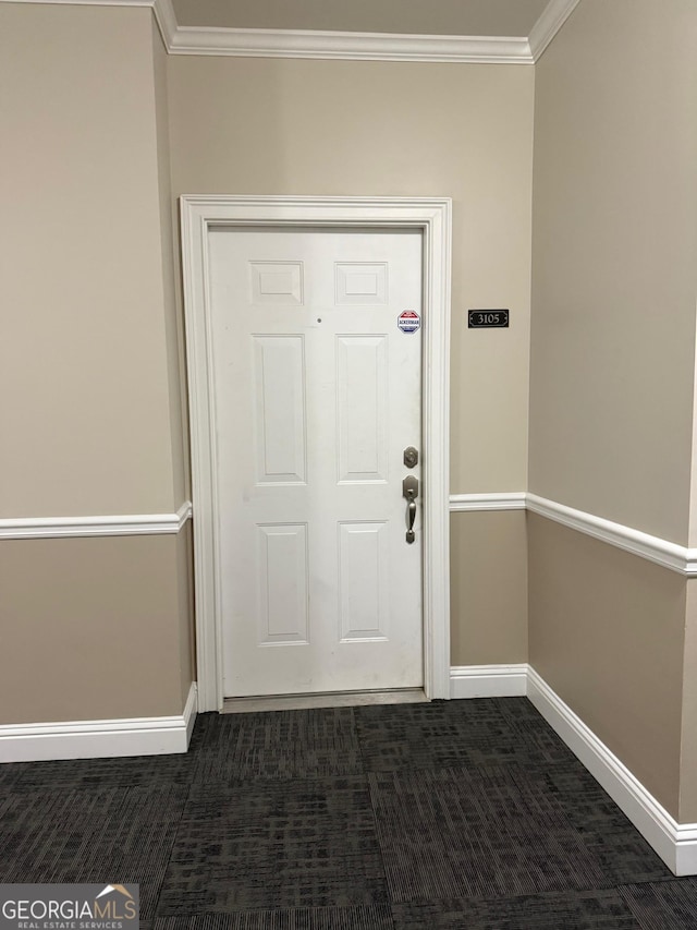 1955 Nocturne Dr Unit 3105, Alpharetta, GA 30009 - entrance foyer with ornamental molding and dark carpet
