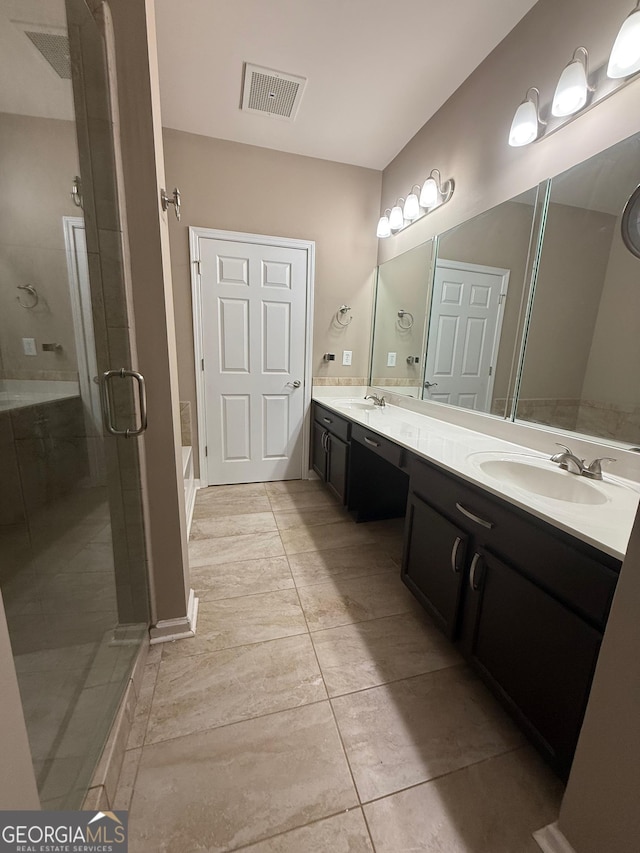 1955 Nocturne Dr Unit 3105, Alpharetta, GA 30009 - bathroom with a shower stall, double vanity, and a tub