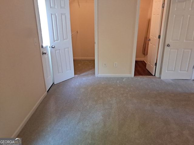 41 Middlebrook Dr, Cartersville, GA 30120 - unfurnished bedroom featuring carpet flooring and a walk in closet
