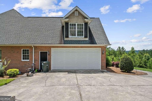 262 Pinnacle Pointe Dr, Rocky Face, GA 30740 - view of front of property with driveway, brick siding, and a shingled roof