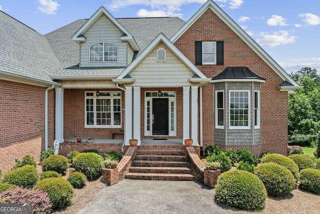 262 Pinnacle Pointe Dr, Rocky Face, GA 30740 - view of front of property featuring brick siding, covered porch, and roof with shingles