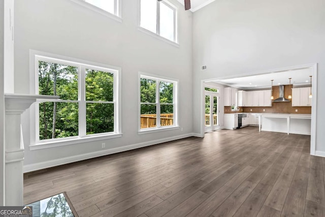 7449 Waterview Cv, Douglasville, GA 30135 - unfurnished living room with dark wood-style floors and a towering ceiling