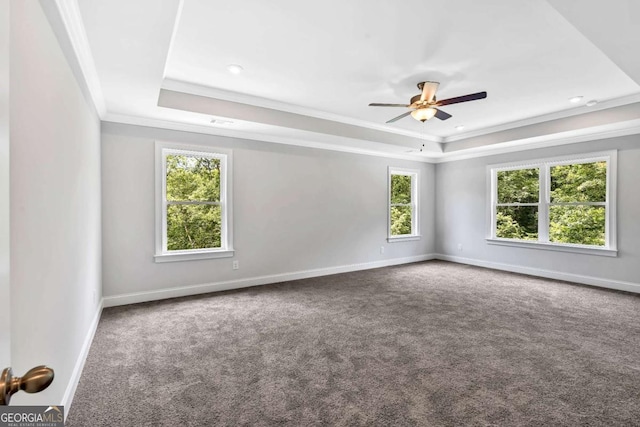 7449 Waterview Cv, Douglasville, GA 30135 - carpeted empty room with a raised ceiling, crown molding, ceiling fan, and recessed lighting