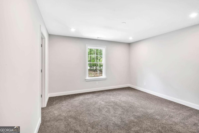 7449 Waterview Cv, Douglasville, GA 30135 - carpeted empty room with baseboards and recessed lighting