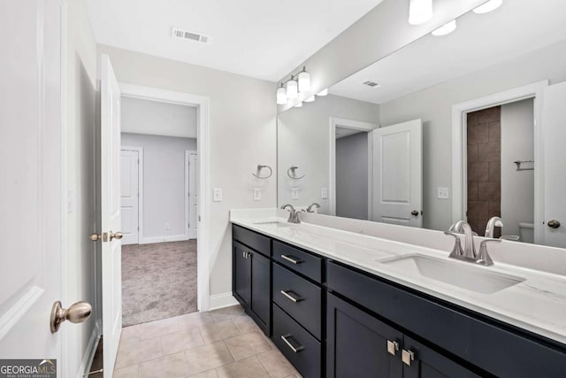7449 Waterview Cv, Douglasville, GA 30135 - bathroom featuring double vanity and tile patterned floors