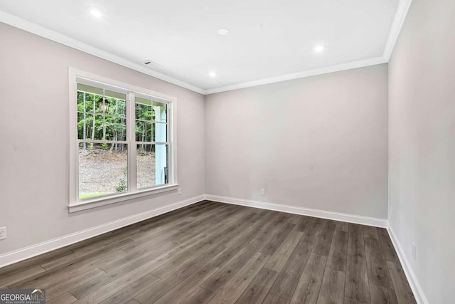 7449 Waterview Cv, Douglasville, GA 30135 - unfurnished room featuring ornamental molding, dark wood-style floors, and recessed lighting