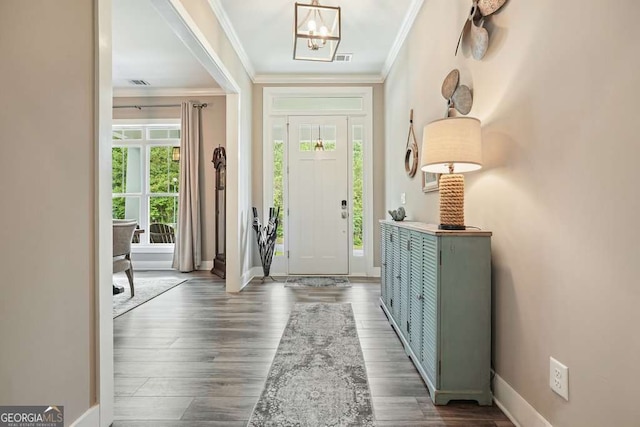 287 Flower Farm Dr, Acworth, GA 30101 - foyer entrance featuring ornamental molding, a chandelier, and wood finished floors