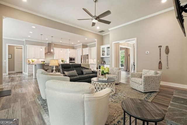 287 Flower Farm Dr, Acworth, GA 30101 - living area with wood finished floors, ceiling fan, recessed lighting, crown molding, and wine cooler