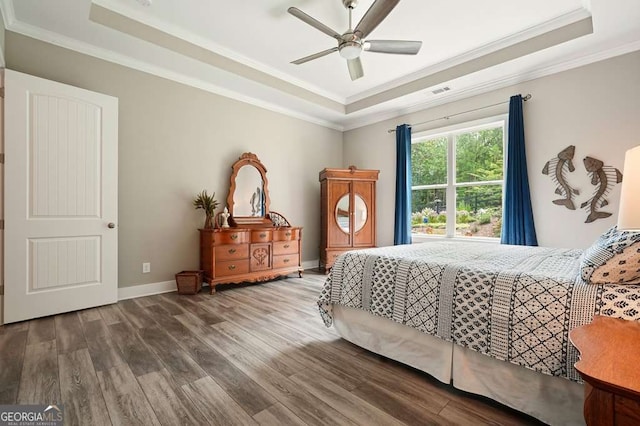 287 Flower Farm Dr, Acworth, GA 30101 - bedroom featuring a tray ceiling, ornamental molding, wood finished floors, and a ceiling fan