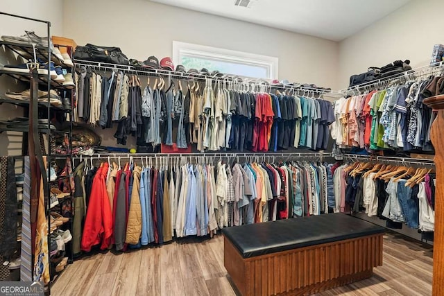 287 Flower Farm Dr, Acworth, GA 30101 - walk in closet with wood finished floors