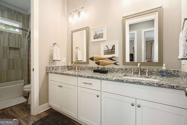 287 Flower Farm Dr, Acworth, GA 30101 - full bath featuring double vanity, wood finished floors, and shower / bath combination with curtain