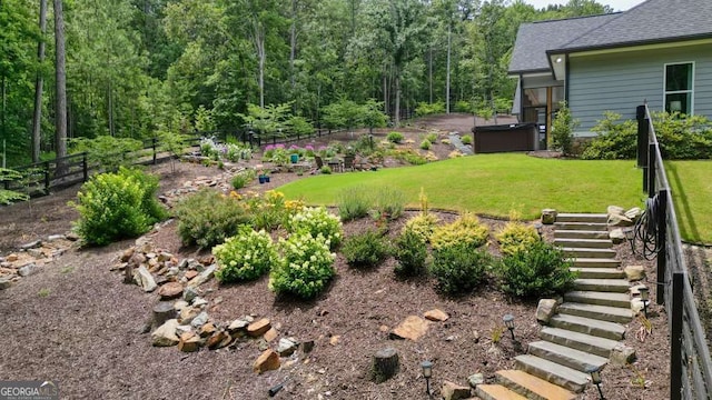 287 Flower Farm Dr, Acworth, GA 30101 - view of yard featuring stairway, a forest view, a hot tub, and a garden