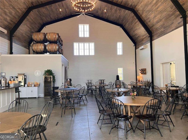 287 Flower Farm Dr, Acworth, GA 30101 - dining area with high vaulted ceiling, concrete floors, and wood ceiling