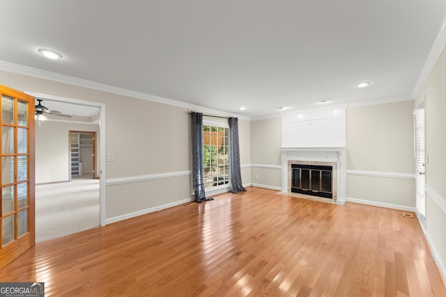 1655 Oak Crest Ct, Marietta, GA 30066 - unfurnished living room with a fireplace with flush hearth, light wood-style flooring, crown molding, a ceiling fan, and recessed lighting