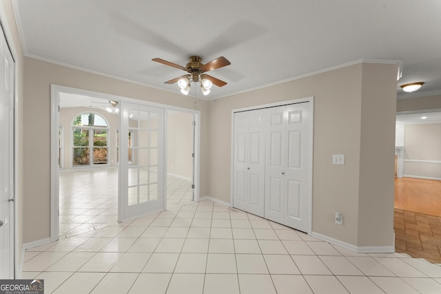 1655 Oak Crest Ct, Marietta, GA 30066 - unfurnished bedroom with ornamental molding, a closet, and a ceiling fan