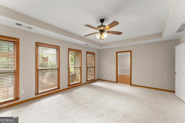 1655 Oak Crest Ct, Marietta, GA 30066 - unfurnished room featuring a ceiling fan, a tray ceiling, and light colored carpet