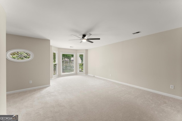 1655 Oak Crest Ct, Marietta, GA 30066 - empty room featuring ceiling fan and light colored carpet