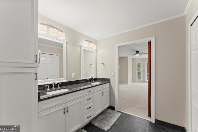 1655 Oak Crest Ct, Marietta, GA 30066 - full bathroom with double vanity, crown molding, tile patterned flooring, and a ceiling fan