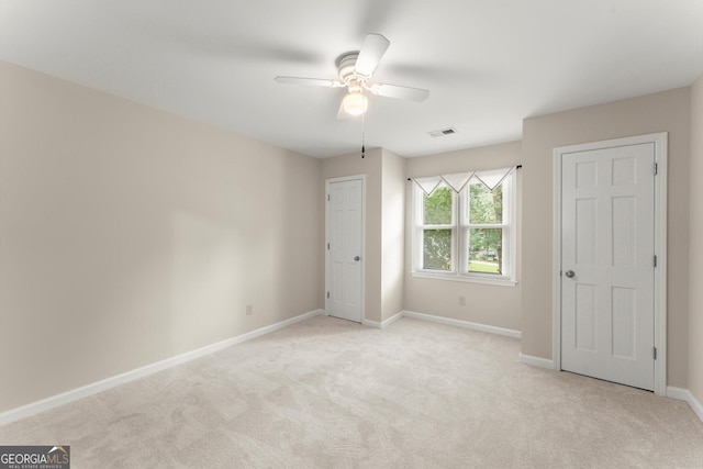 1655 Oak Crest Ct, Marietta, GA 30066 - unfurnished bedroom featuring light carpet and ceiling fan