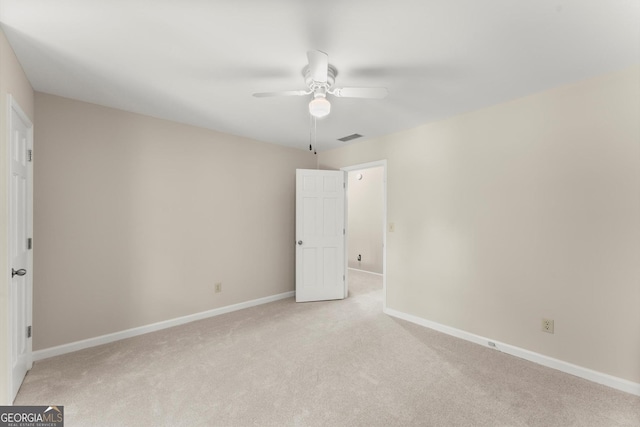 1655 Oak Crest Ct, Marietta, GA 30066 - unfurnished bedroom featuring light carpet and a ceiling fan
