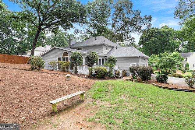 1655 Oak Crest Ct, Marietta, GA 30066 - view of front of property with a chimney and roof with shingles