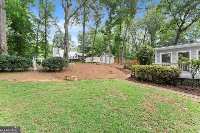 1655 Oak Crest Ct, Marietta, GA 30066 - view of yard with a storage unit