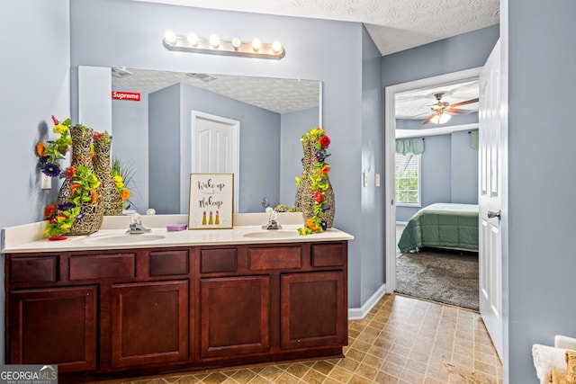 3832 Augustine Pl, Rex, GA 30273 - full bathroom with double vanity, ensuite bath, and a ceiling fan