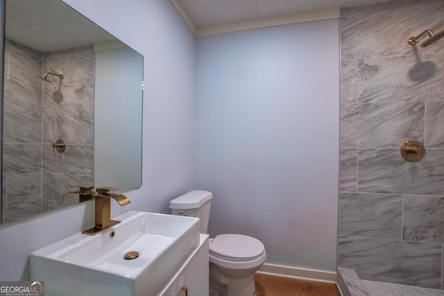 7144 Carolyn Cir, Lithia Springs, GA 30122 - bathroom featuring a tile shower and vanity