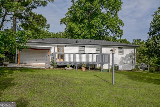 7144 Carolyn Cir, Lithia Springs, GA 30122 - rear view of house with a yard, a wooden deck, and brick siding