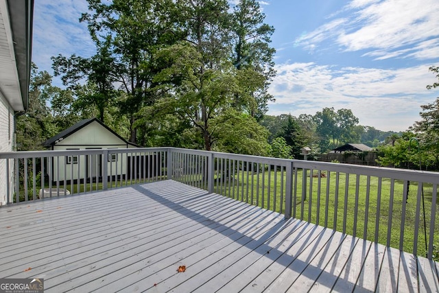 7144 Carolyn Cir, Lithia Springs, GA 30122 - wooden terrace with a fenced backyard and view of wooded area
