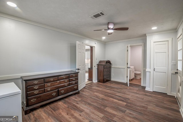 7144 Carolyn Cir, Lithia Springs, GA 30122 - unfurnished bedroom featuring dark wood-style flooring, recessed lighting, crown molding, connected bathroom, and ceiling fan