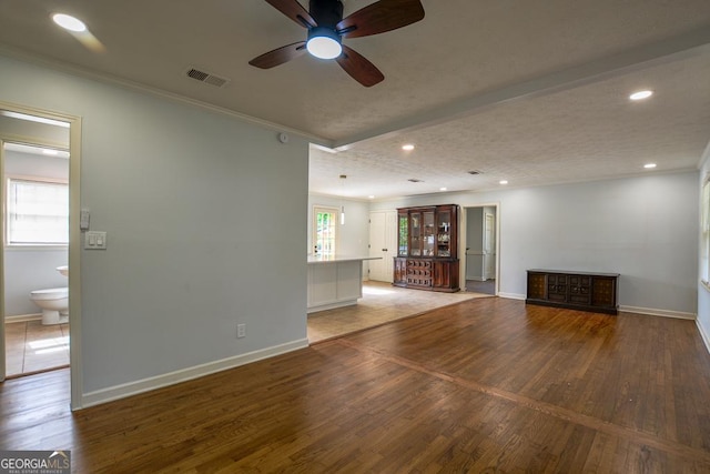 7144 Carolyn Cir, Lithia Springs, GA 30122 - unfurnished living room with a ceiling fan, light wood finished floors, recessed lighting, and ornamental molding