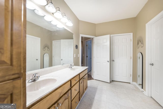 132 Hidden Creek Cir, Lizella, GA 31052 - full bath featuring double vanity and tile patterned flooring