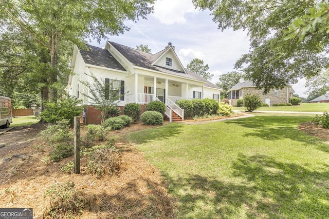 132 Hidden Creek Cir, Lizella, GA 31052 - view of front of property with covered porch, a front yard, a chimney, and a ceiling fan